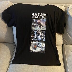 Play Cloths Black T-Shirt with Surveillance Graphic